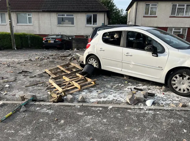 Damaged car following night of violence in Cardiff