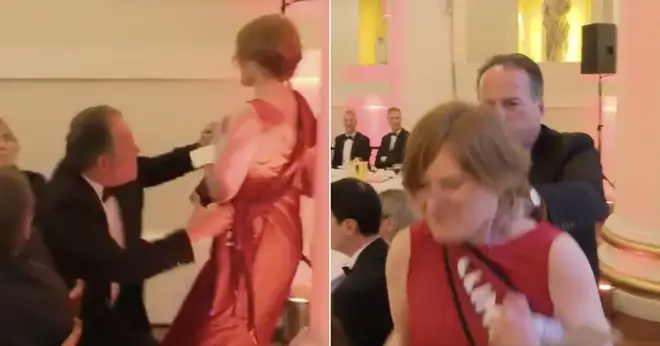 The moment MP Mark Field physically removes a Greenpeace protester