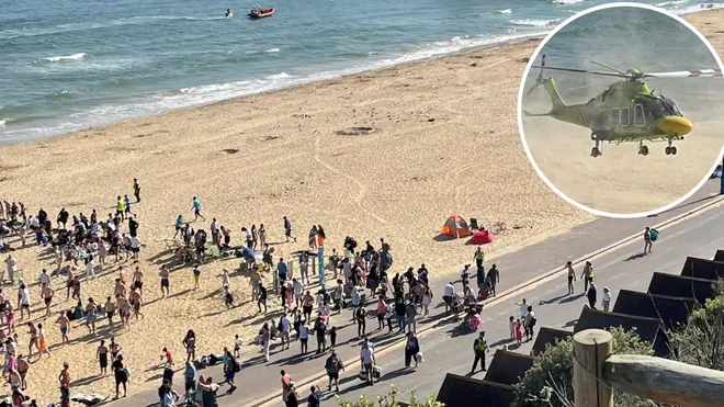 A man has been arrested on suspicion of manslaughter after two children died on a Bournemouth beach