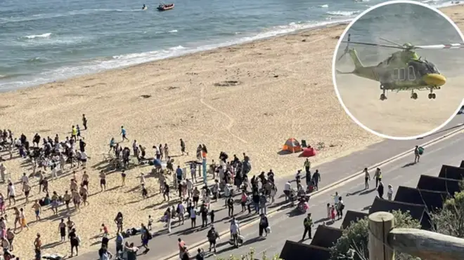 A man has been arrested on suspicion of manslaughter after two children died on a Bournemouth beach.
