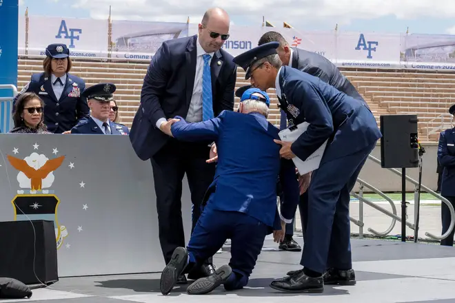 President Joe Biden falls on stage during the 2023 United States Air Force Academy Graduation Ceremony at Falcon Stadium, Thursday, June 1, 2023
