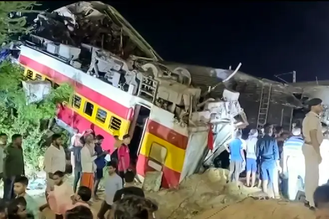 Tootage showed flipped over train carriages after the three-train collision