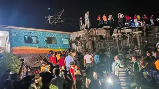 Rescuers work at the site of passenger trains that derailed in Balasore district, in the eastern Indian state of Orissa, Friday, June 2, 2023. Two passenger trains derailed in India, killing at least