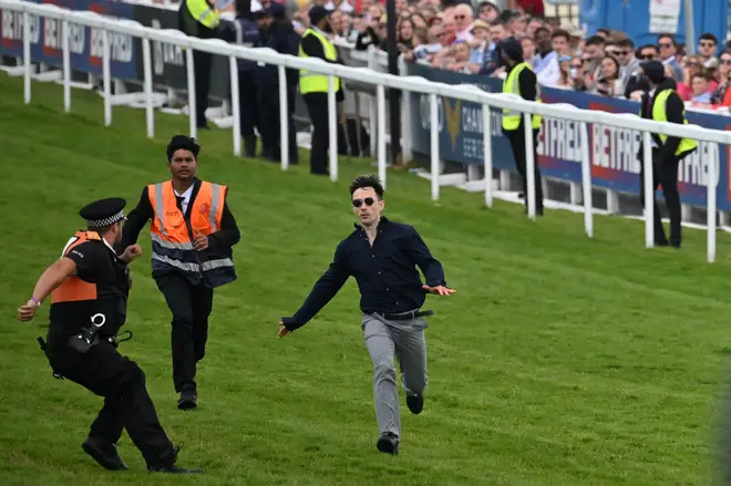 The protester did not manage to disrupt the race