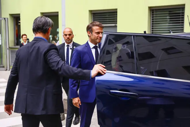 France's President Emmanuel Macron leaves the hospital