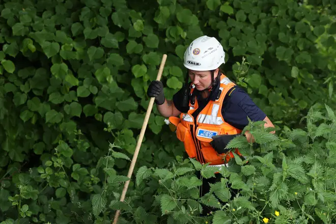 Community Rescue Service volunteers in thick undergrowth near the River Braid in Ballymena during the search for Chloe Mitchell