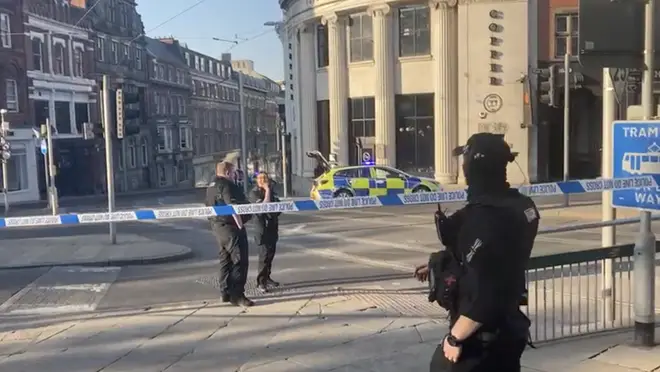 Armed police deployed to the scene