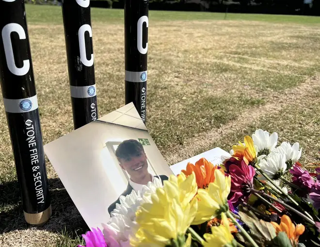 Flowers left by the wicket at Bishops Hull Cricket Cricket Club in Taunton, in tribute to 19 year old Barnaby Webber