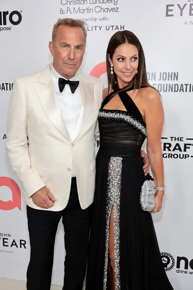 Kevin Costner and Christine Baumgartner at the 2022 Vanity Fair Oscar Party
