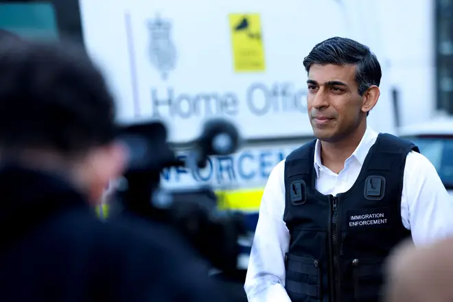 Prime Minister Rishi Sunak speaks to the media outside Wembley Police Station in north west London.