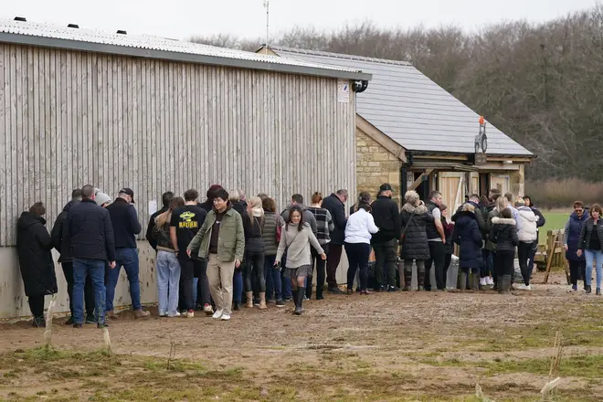 Visitors queue at Diddly Squat Farm Shop in Chipping Norton.