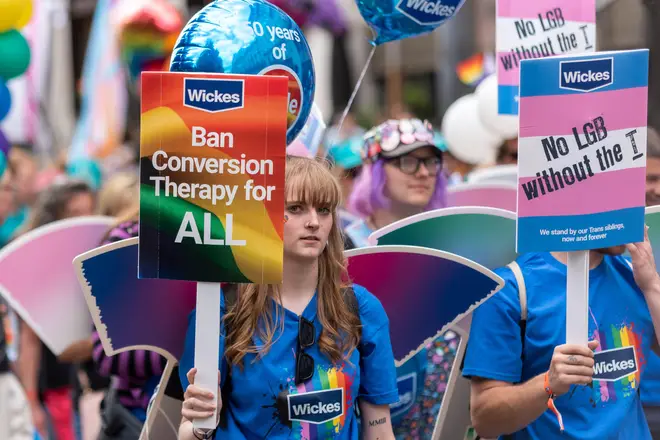 The company held signs that said 'no LGB without the T' at the pride event.