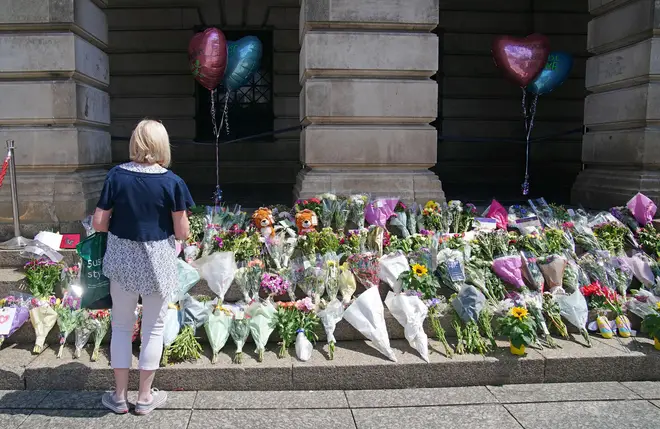 Floral tributes in Nottingham after the fatal stabbing of three people in a series of attacks