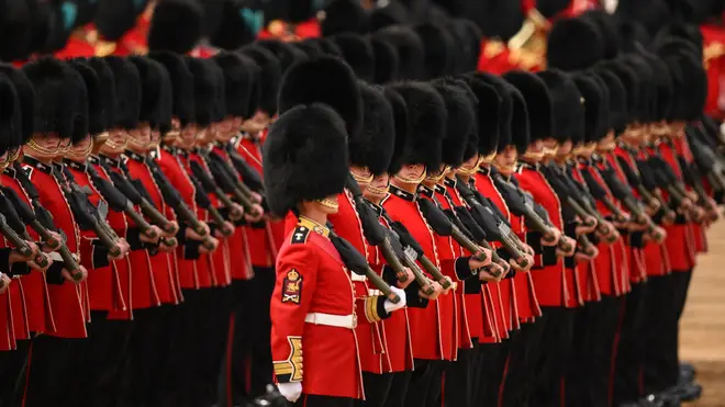 Members of the Welsh Guards perform on Horse Guards Parade