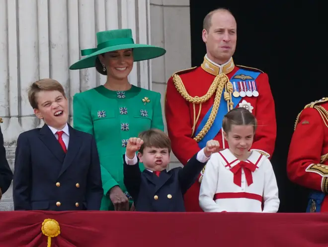 Prince George, the Princess of Wales, Prince Louis, the Prince of Wales and Princess Charlotte on the balcony of Buckingham Palace