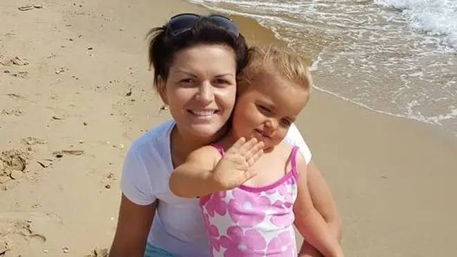 Mum Monika plays on the beach with daughter Maja days before they died