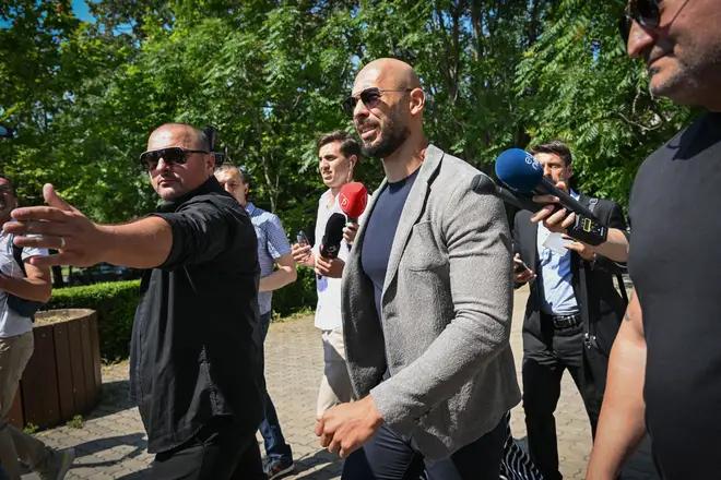 Andrew Tate arriving at the Municipal Court of Bucharest, Romania, on June 21, 2023, to answer the charges