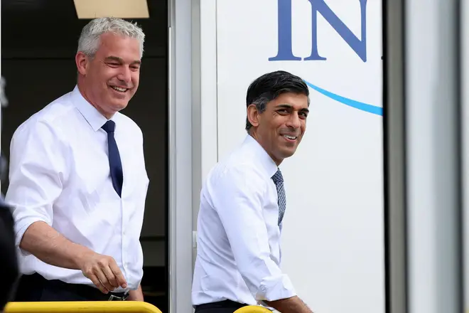 Britain's Prime Minister Rishi Sunak, right, and Health and Social Care Secretary Steve Barclay visit a mobile lung health check unit in Nottingham