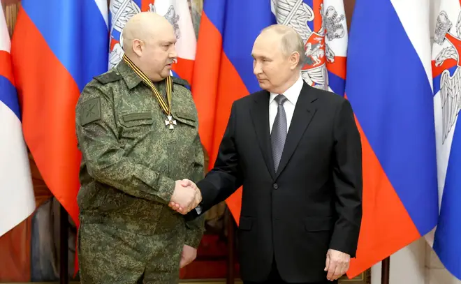 Surovikin with Putin last December