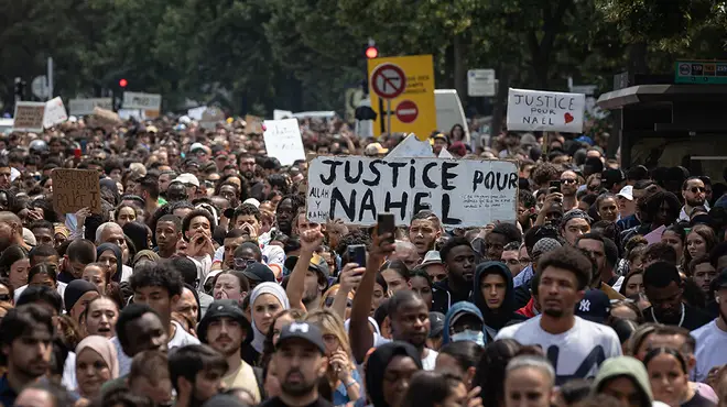 Paris streets are filled with demonstrations during the day as they hold 'justice for Nahel' posters