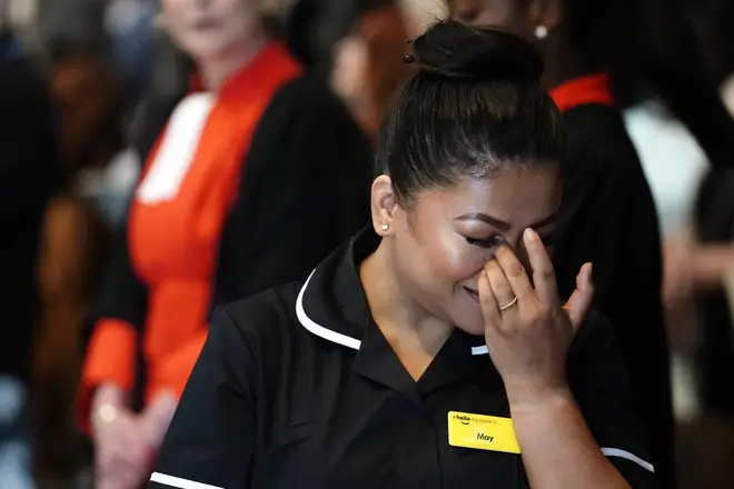Nurse May Parsons weeps during today's service honouring members of the NHS