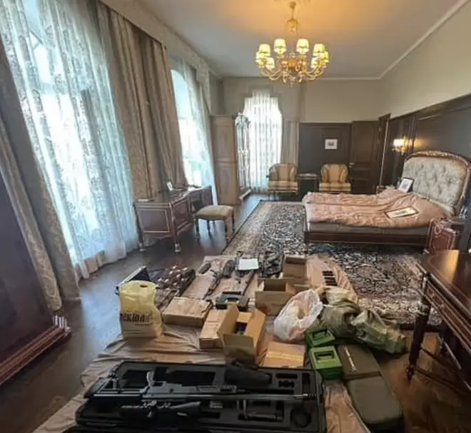 One of the images shows an opulently decorated bedroom filled with guns and ammo