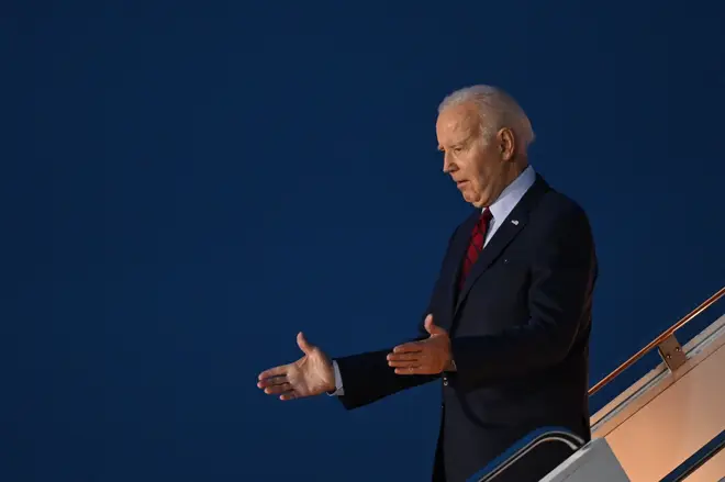 US President Joe Biden disembarks from Air Force One after landing at Stansted