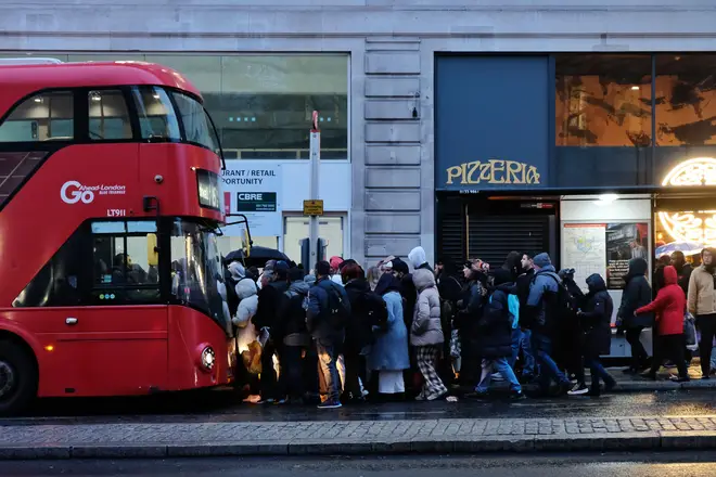People cram onto a London bus during a Tube strike