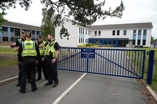 Police gather outside Tewkesbury school