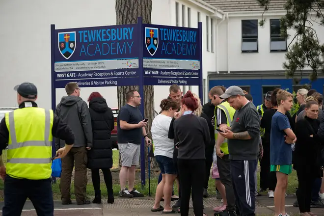 Anxious parents gather outside Tewkesbury Academy