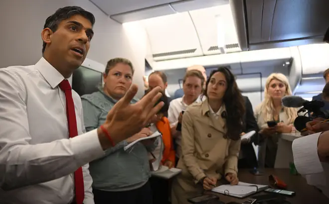 Prime Minister Rishi Sunak speaking to journalists on the plane while travelling to the Nato summit in Vilnius, Lithuania. Picture date: Tuesday July 11, 2023.