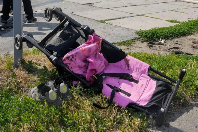 Liza's bloodied pushchair after the attack on the civilian target in Ukraine