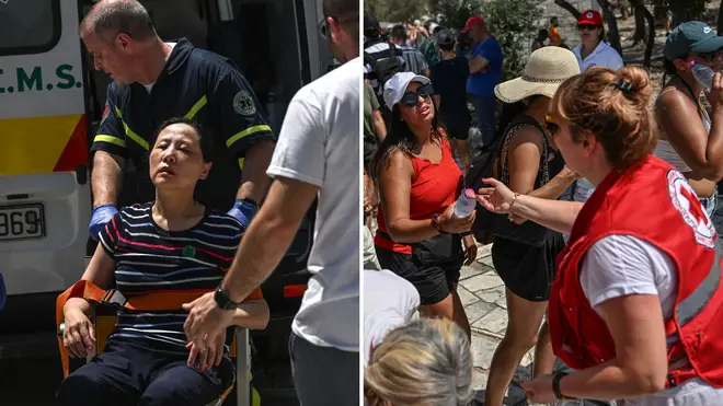 Rescue workers in Athens have been assisting tourists amid the deadly temperatures.