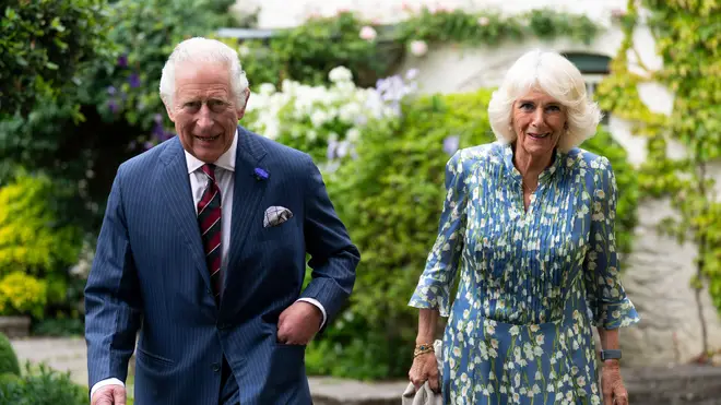 King Charles and Queen Camilla are pictured on the property at a reception in July 2022
