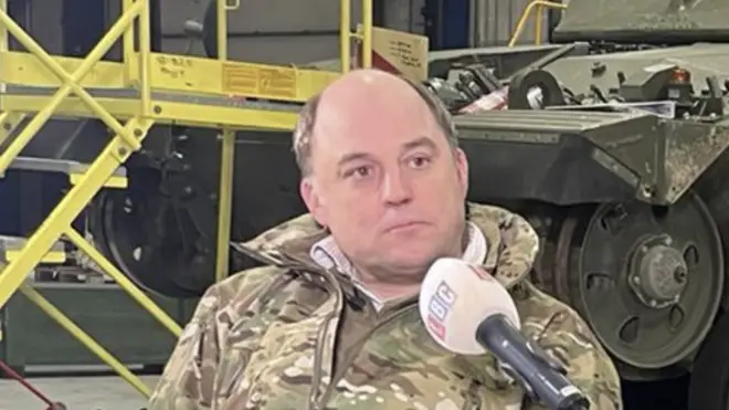 Ben Wallace is pictured wearing military uniform during an interview with LBC