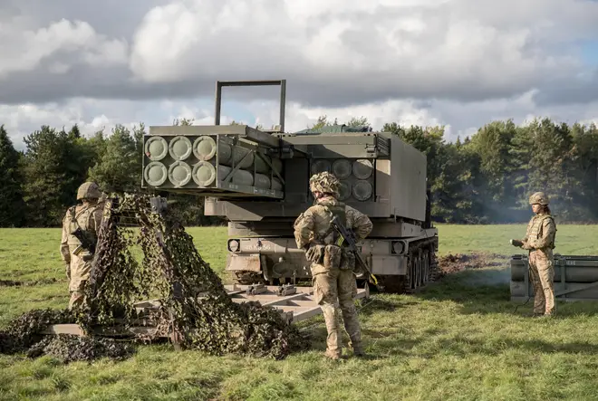 Members of 26 Regiment Royal Artillery position their Multi Launch Rocket System (MLRS) on Salisbury Plain