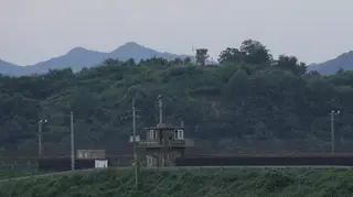A North Korean military guard post, rear, and South Korea post, bottom, are seen in Paju near the border with North Korea, South Korea