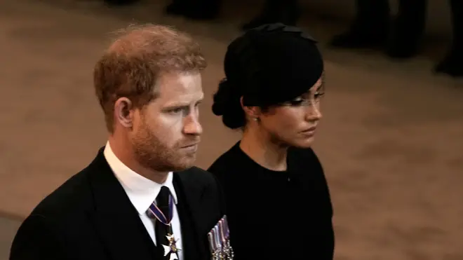 Prince Harry and Meghan leaving Westminster Hall in London