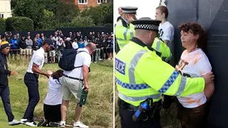 A woman was escorted from the 17th field after attempting to disrupt the Open.