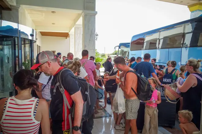 Brits and other tourists are trying to flee the Rhodes fire