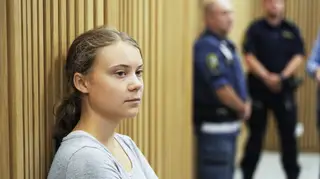 Climate activist Greta Thunberg waits for a hearing in a court in Malmo, Sweden
