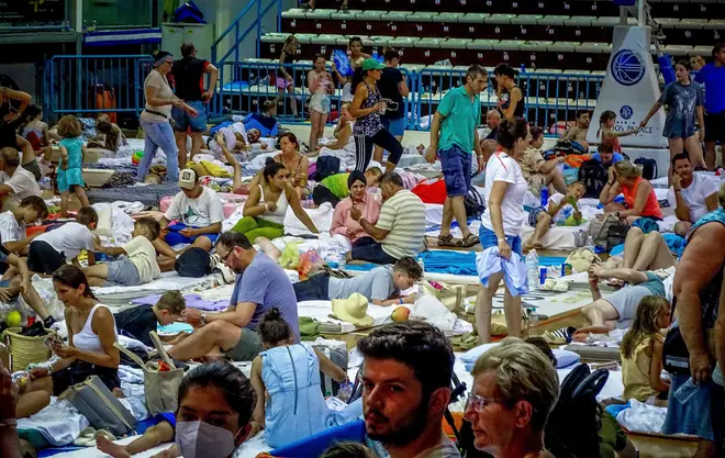 Evacuees have been forced to sleep on mattresses outside and in refuge centres.