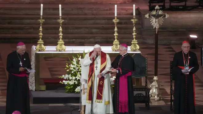 Pope Francis, with Lisbon's Patriarch, Cardinal Manuel Clemente, right, Archbishop Diego Ravelli, second from right, President of the Portuguese Conference of Bishops José Ornelas Carvalho, left