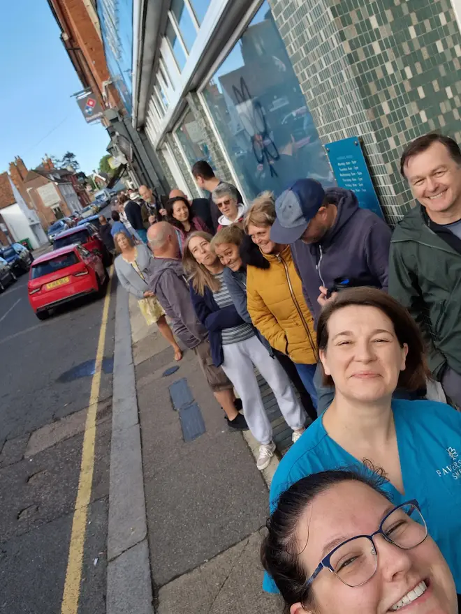 The practice posted a photo of the queue for appointments