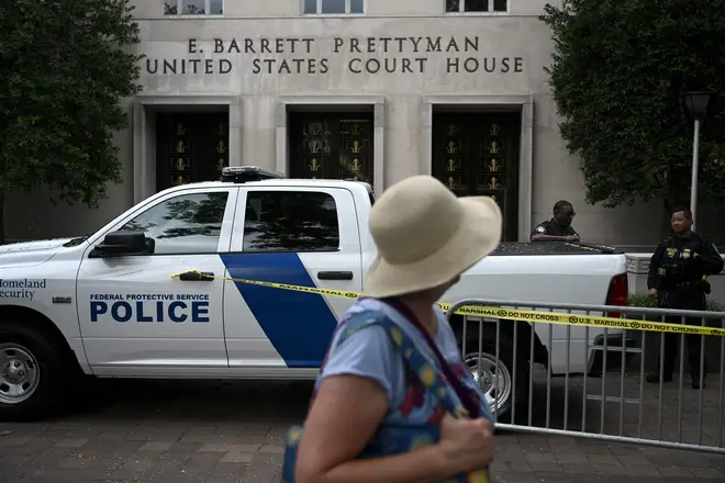 Police patrol outside the E. Barrett Prettyman US Courthouse in Washington, DC, on August 3, 2023