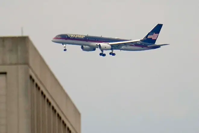 Former President Donald Trump's airplane is seen as it makes its final approach into Reagan National Airport, Washington