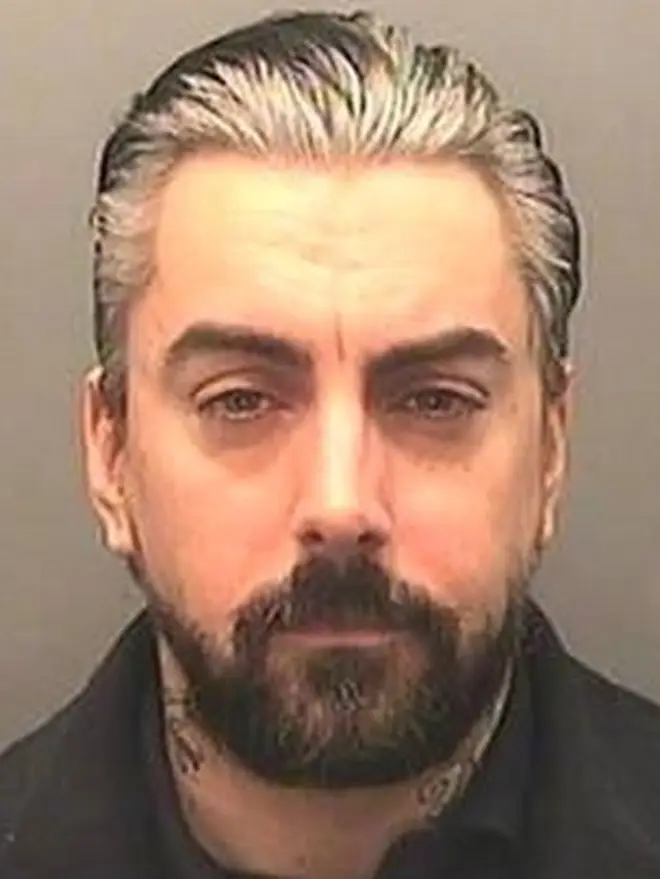 The disgraced frontman is said to have been injured when the three prisoners threatened to stab him ‘in neck’