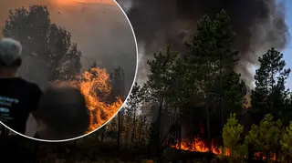 People watch on as wildfires spread through Portugal