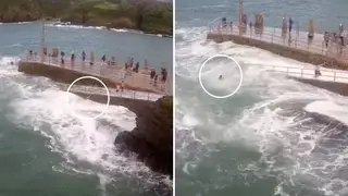 This is the frightening moment a girl is knocked off her feet by volatile waves in Ilfracombe.