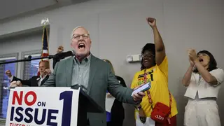 Dennis Willard, spokesperson for One Person One Vote, celebrates the results of the election